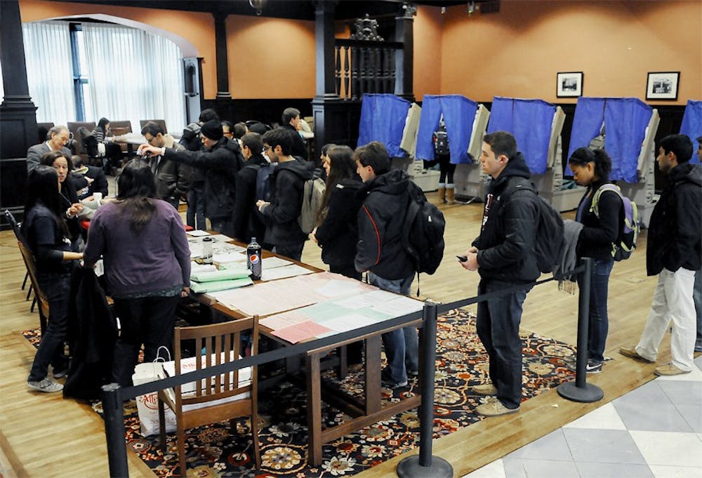 Photographs of students casting their votes in Houston Hall and Hill.