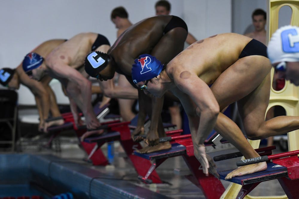 11-05-22-mens-swimming-vs-columbia-alex-fu-samantha-turner