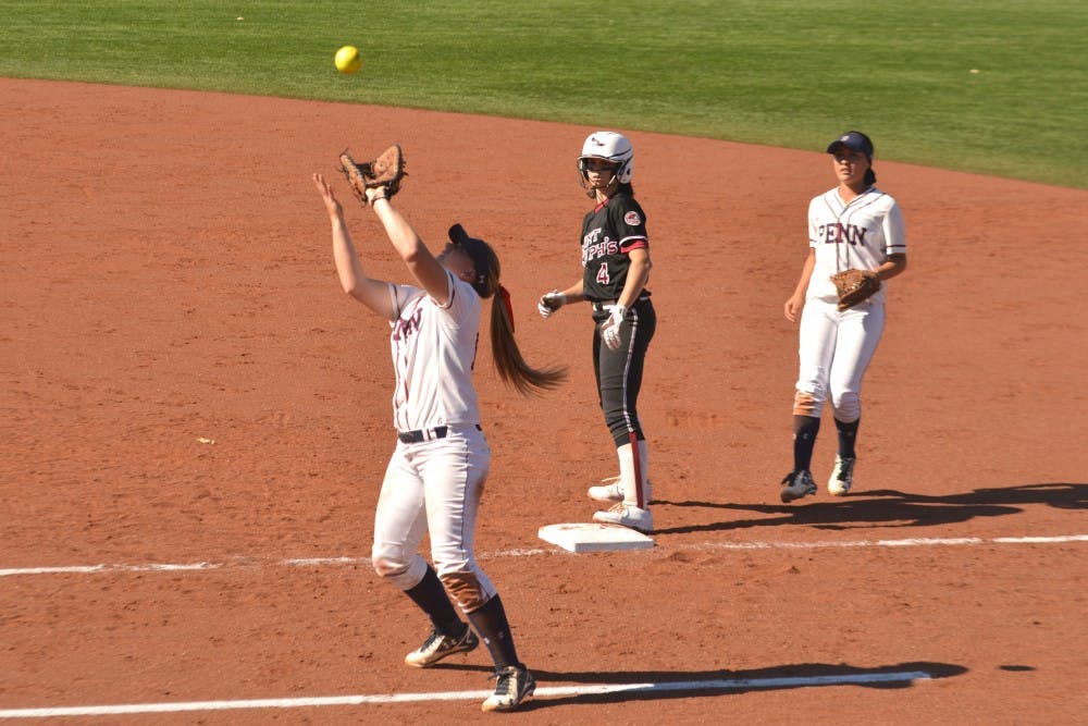First baseman Sarah Cwiertnia makes catch.