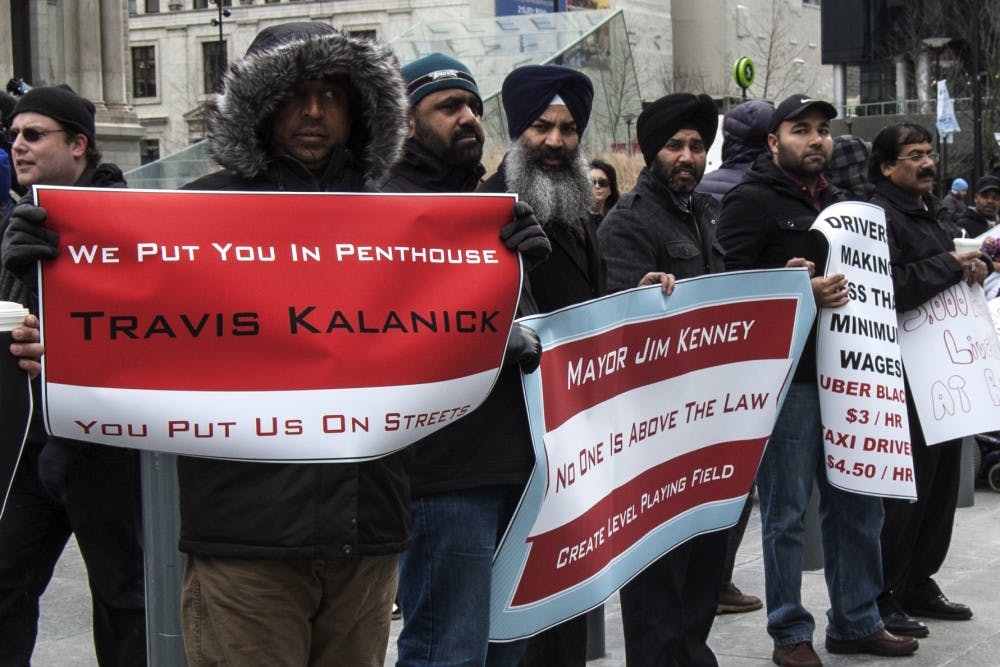 Drivers gathered outside of City Hall on Thursday to raise awareness for licensing issues.