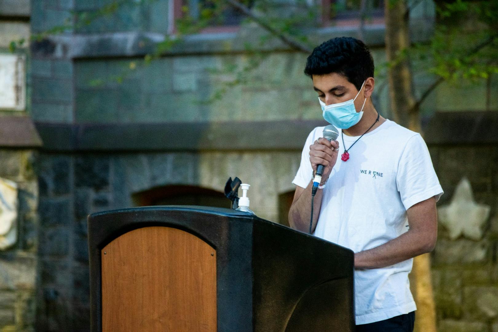 4-20-21 Vigil for the Victims of Gun Violence College Green Candle Milan Chand Mask.jpg