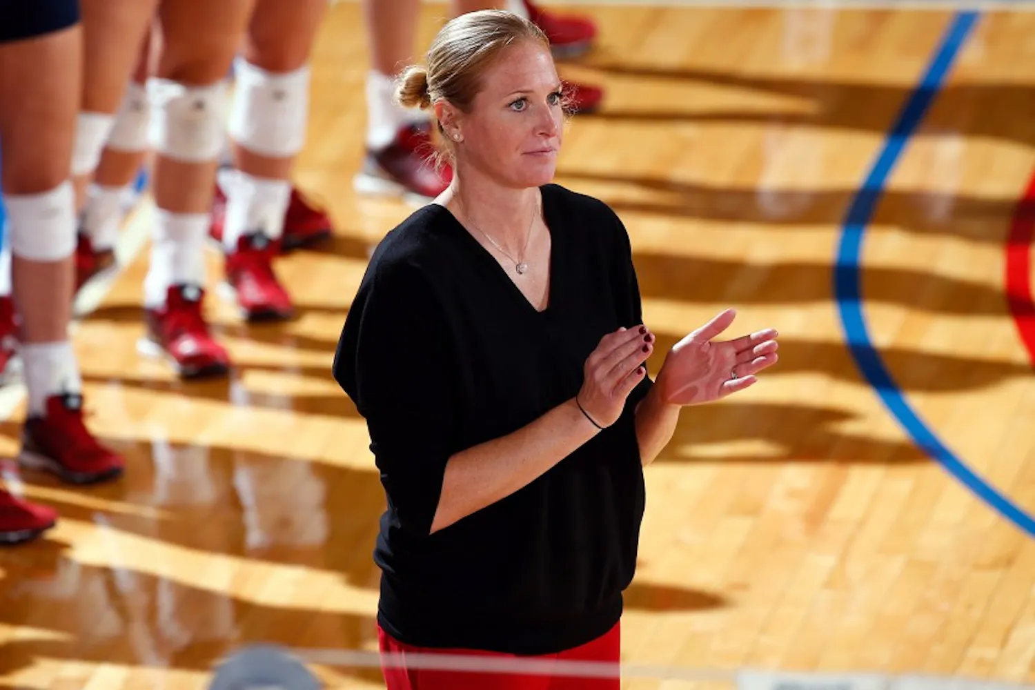 New Penn volleyball coach Katie Schumacher-Cawley looks relaxed here, but her players aren't doing much relaxing in practice.