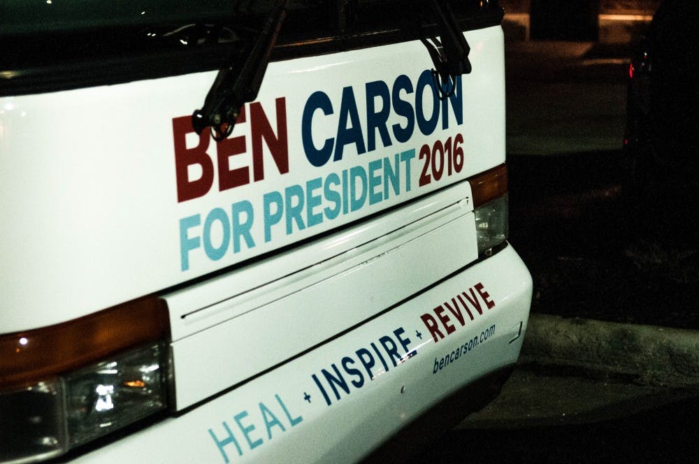 The front of Carson's campaign bus advertise his candidacy with the words 