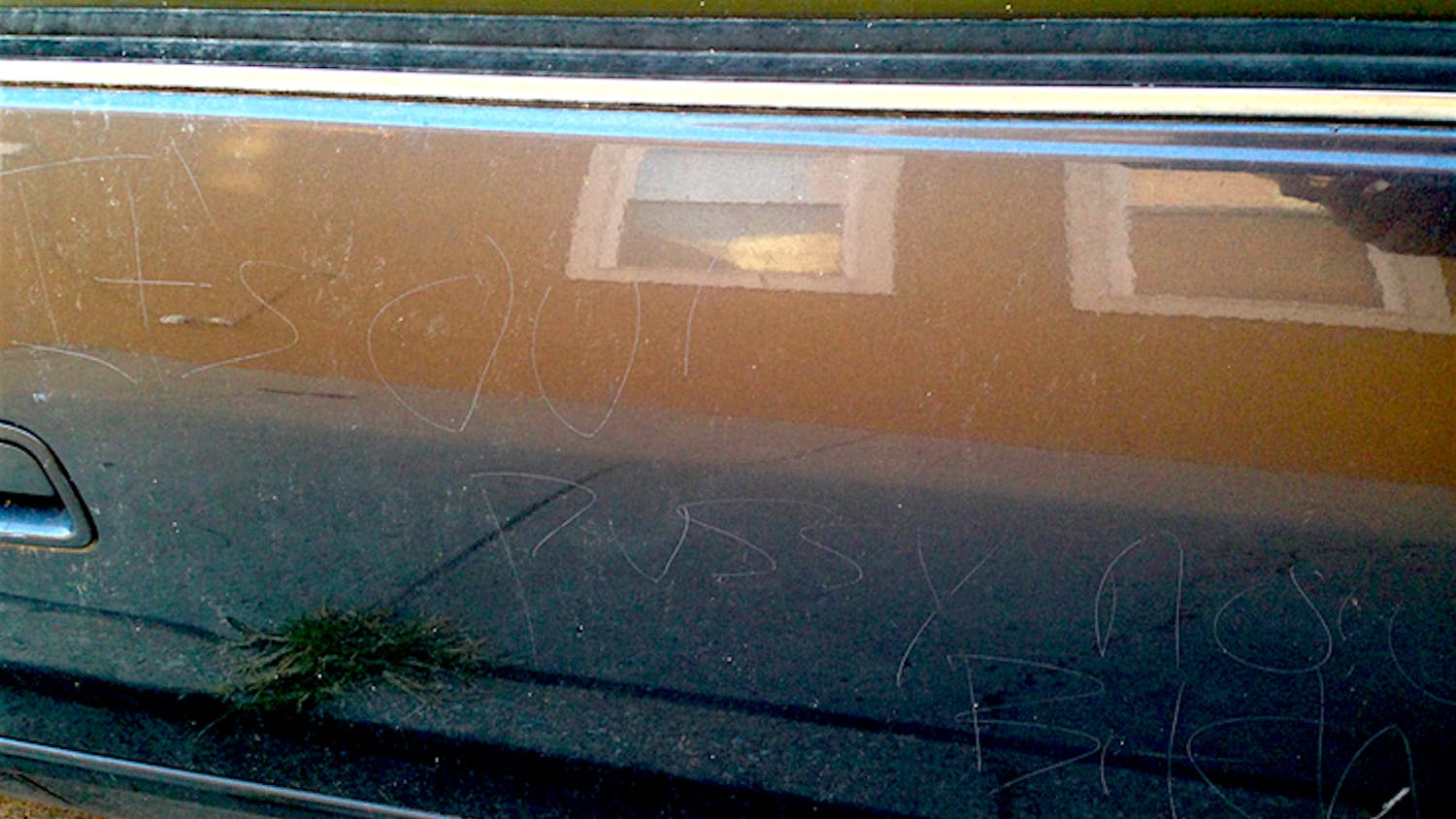 Penn alumna Adrienne Juarascio discovered the phrase "It's our p—y now, bitch" etched into her car about a block from her home in Philadelphia. | Courtesy of Adrienne Juarascio