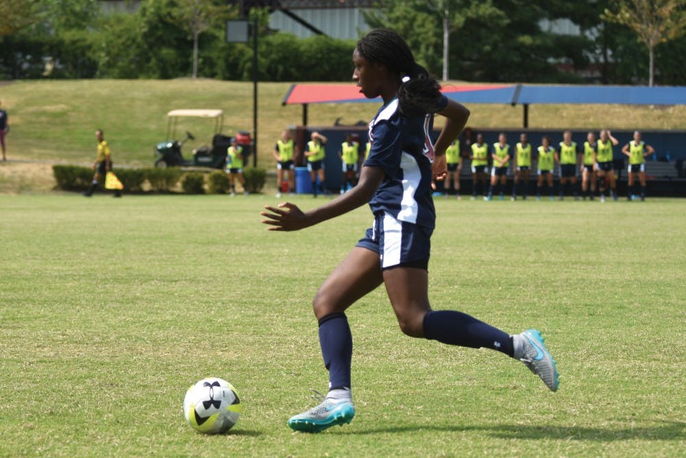 In her first game playing for the Red and Blue, freshman forward Sasha Stephens netted two of the team's three goals.
