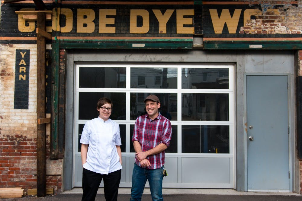 Weckerley's founders Jen and Andy Satinsky outside of Globe Dye Works, where they currently house their ice cream production. 