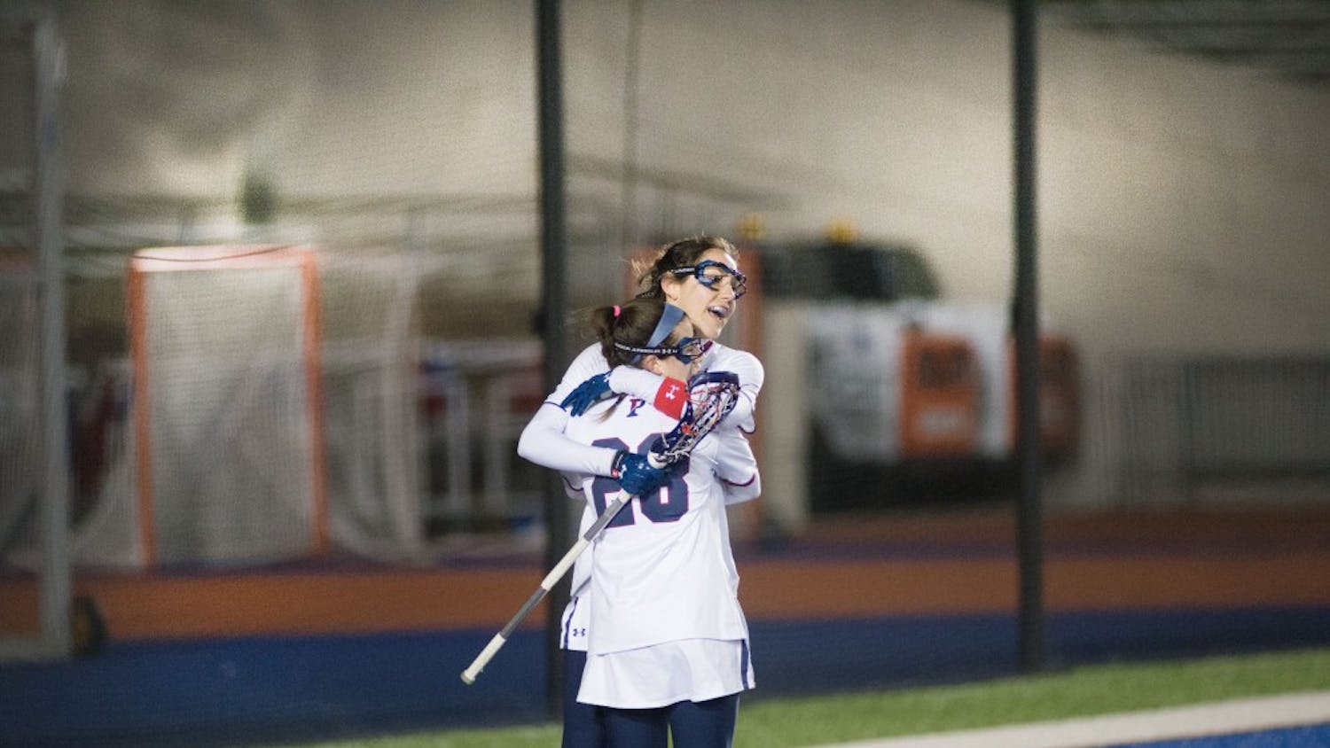 Senior Nina Corcoran stole the show on Sunday, notching five points and scoring the game-winning goal in overtime versus Northwestern.