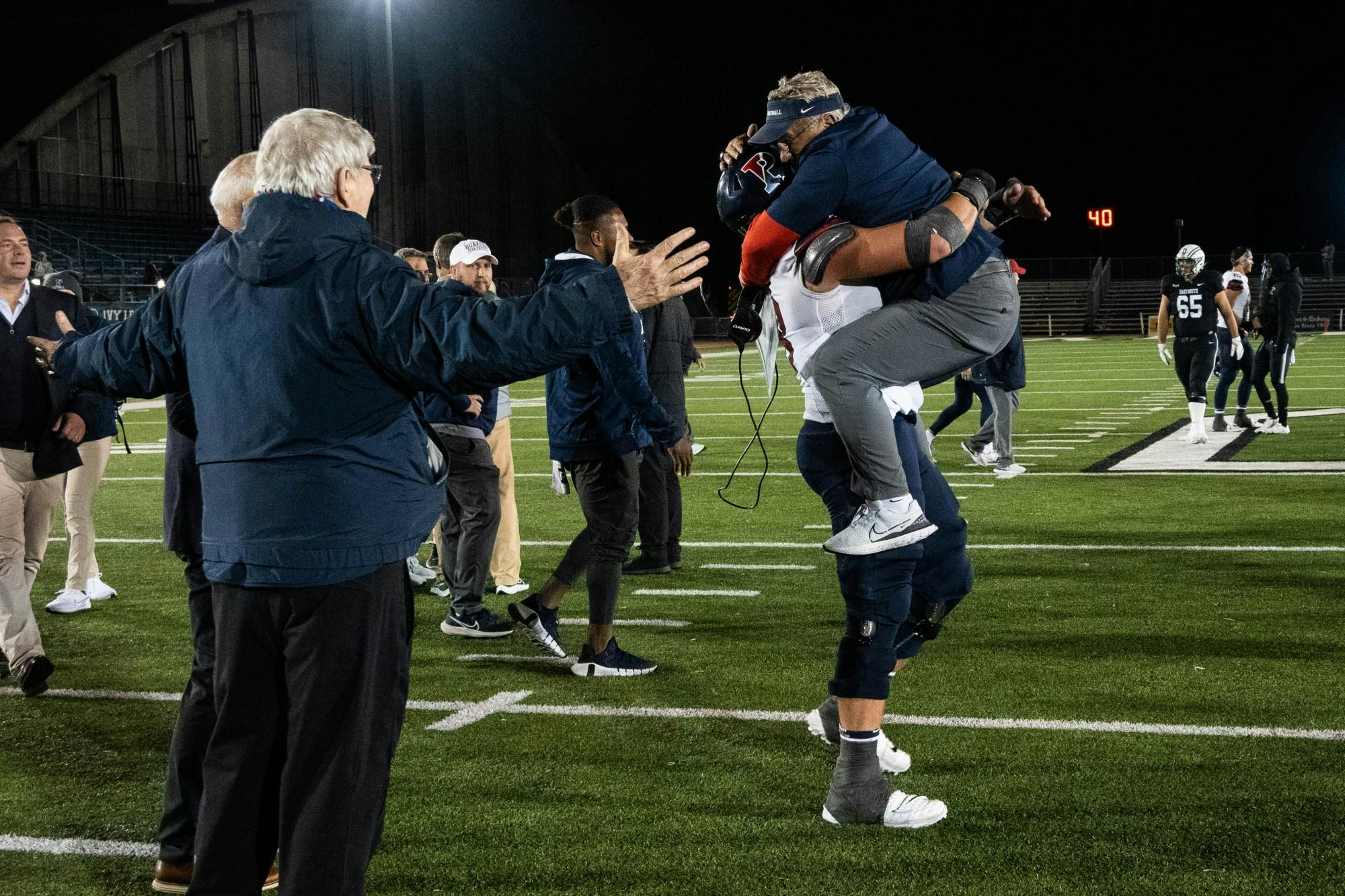 09-30-22 Football vs Dartmouth Team Celebration (Anna Vazhaeparambil)-01.jpg