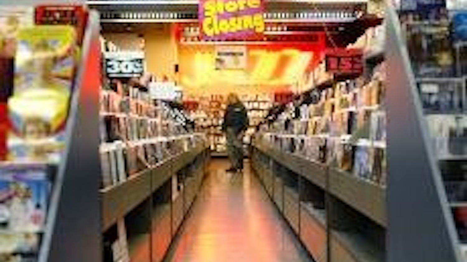 As downloading rises, a music landmark's fall