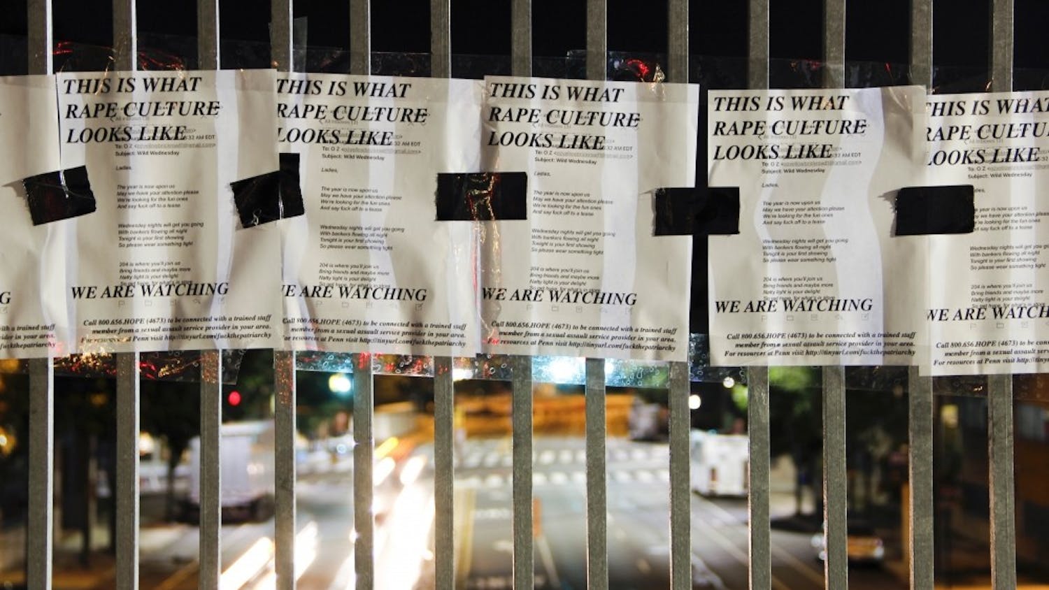 Flyers of an email telling girls to wear tight clothes and drink covered campus Tuesday morning.