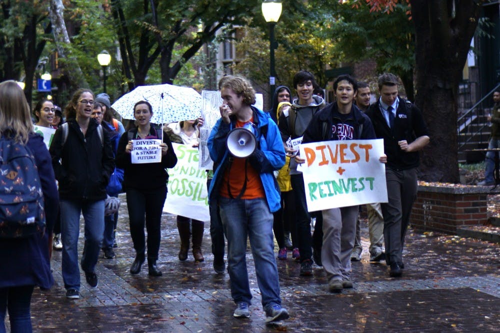 Penn students marched to Houston Hall on Oct. 28 to urge the University to divest from fossil fuel usage.