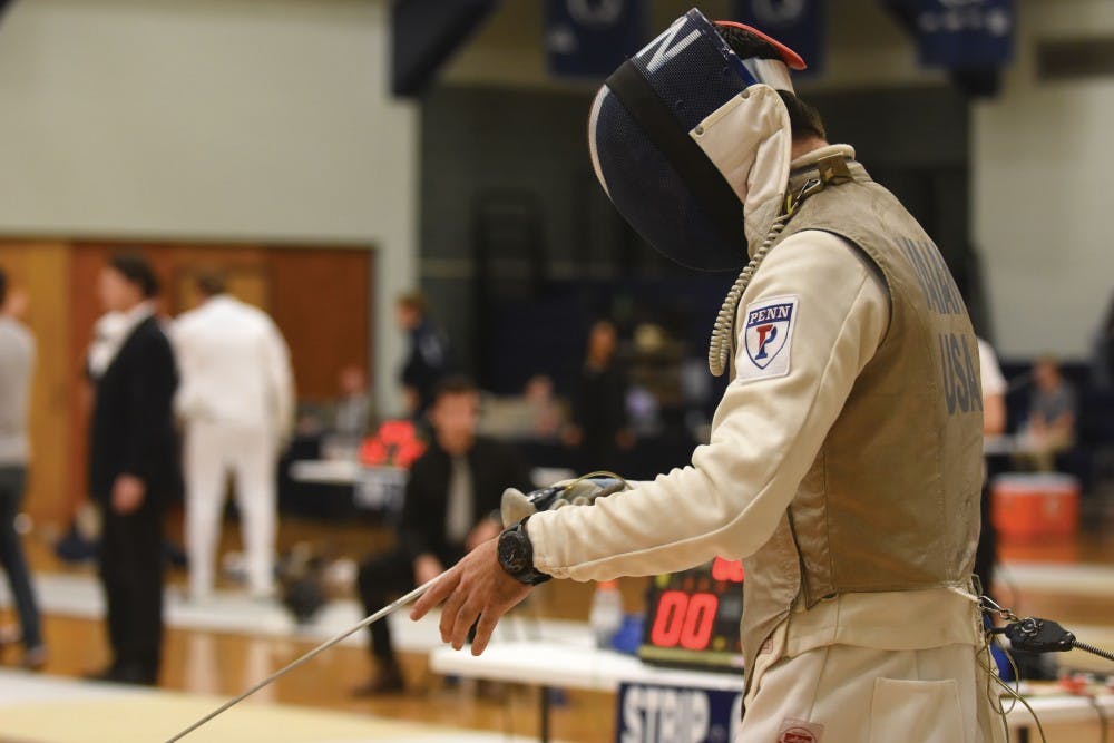 While Penn women's fencing took fourth at the Ivy Championships this weekend, the men took away the trophy, partaking in a three-way tie for first.