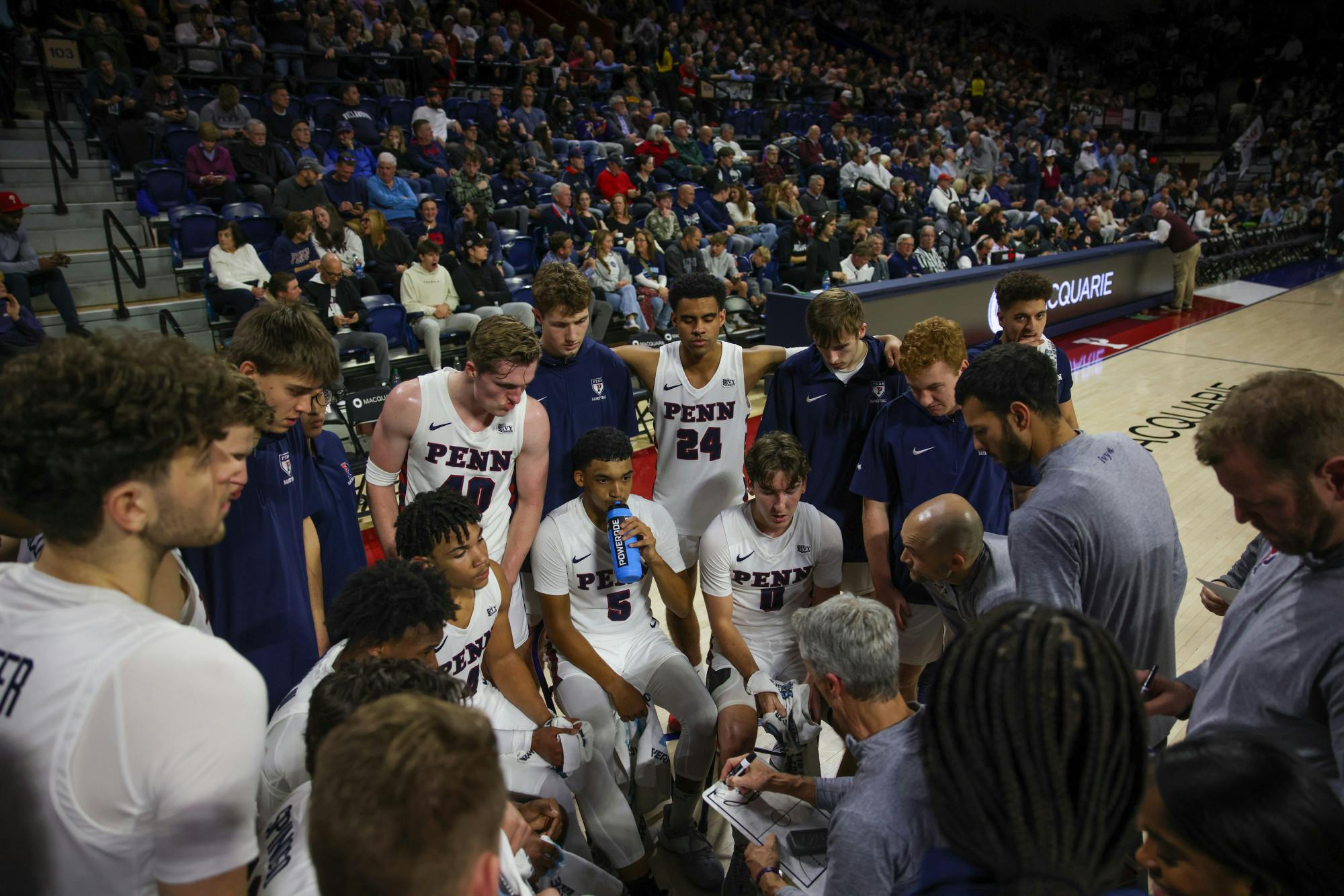 11-13-23 Men's Basketball vs Villanova Huddle (Abhiram Juvvadi).jpg