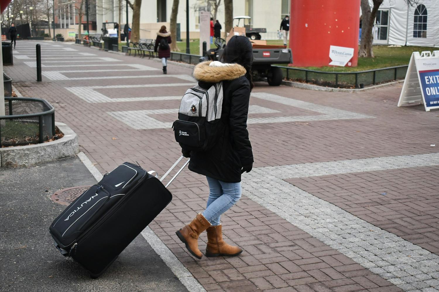 Move-In 2021 Spring Student Crosses Locust Walk Luggage 1.15.jpg