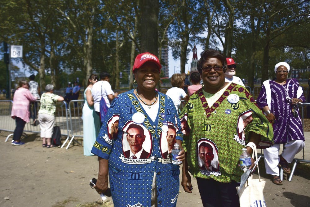 Two Obama supporters wore dresses made in Ghana to the rally.