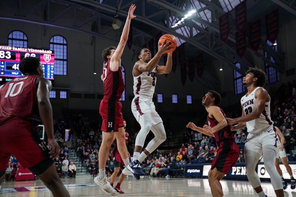 01-28-23-mens-basketball-vs-harvard-jordan-dingle-anna-vazhaeparambil