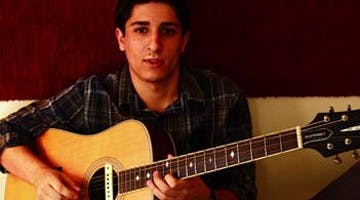 Selling rock singles, saving Darfur