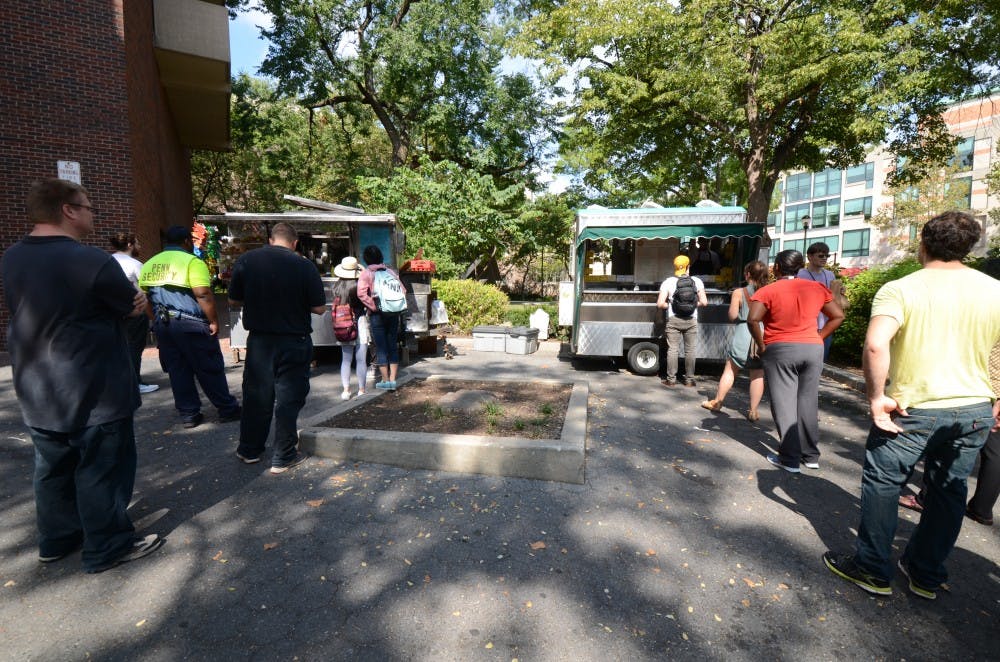 Wednesday: Students, faculty, and staff grab lunch from the food trucks on 34th street.
