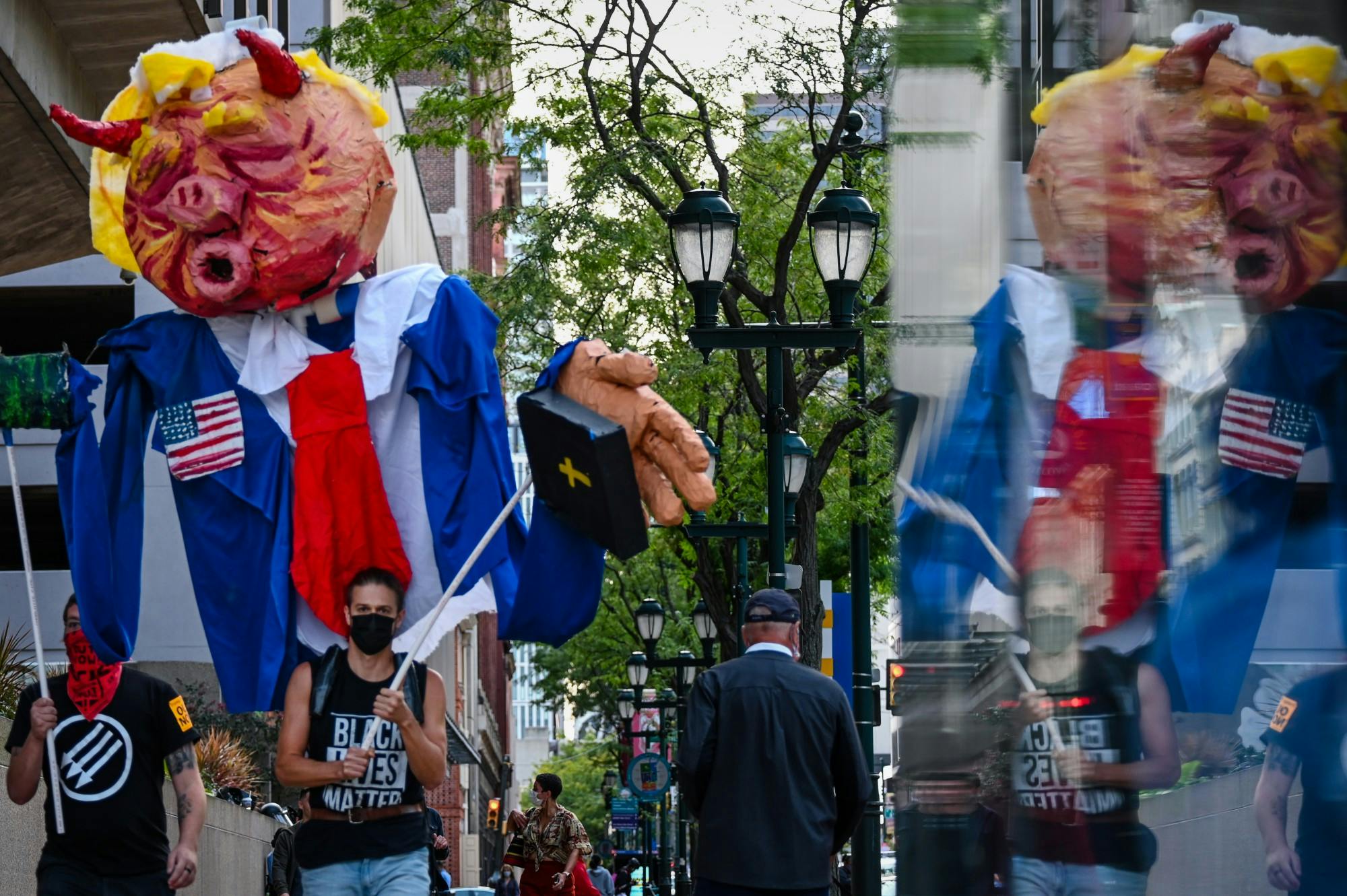 09-15-20 Trump Pence Out Now Protest Pig Reflection.jpg