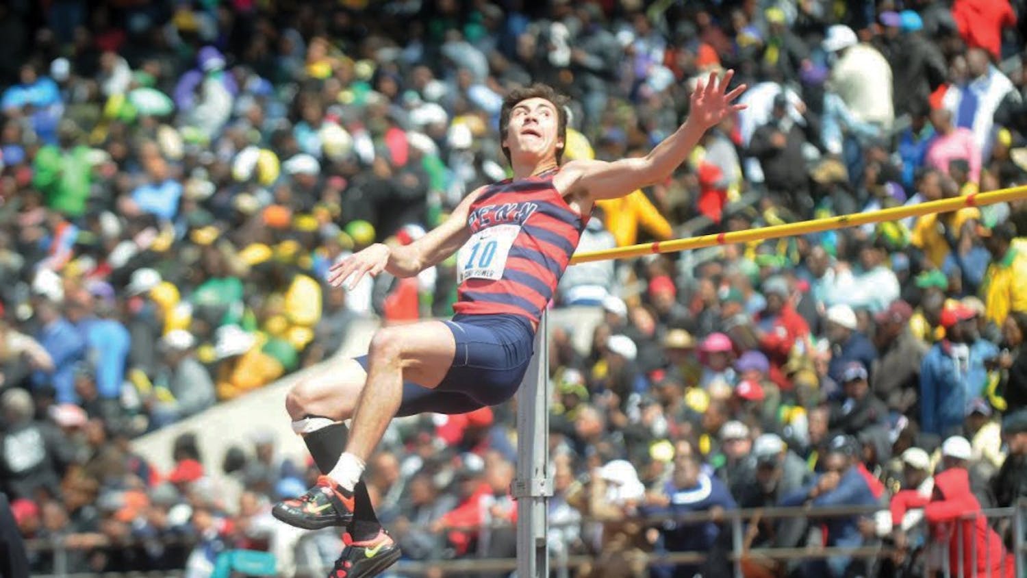 Freshman high-jumper Mike Monroe, shown here clearing a nearly seven-foot jump, was one of five Quakers to qualify for the NCAA Track and Field finals in Eugene, OR.