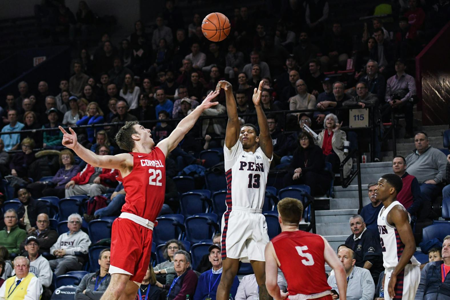 MBB Cornell Eddie Scott Three Pointer by Kylie Cooper.jpg