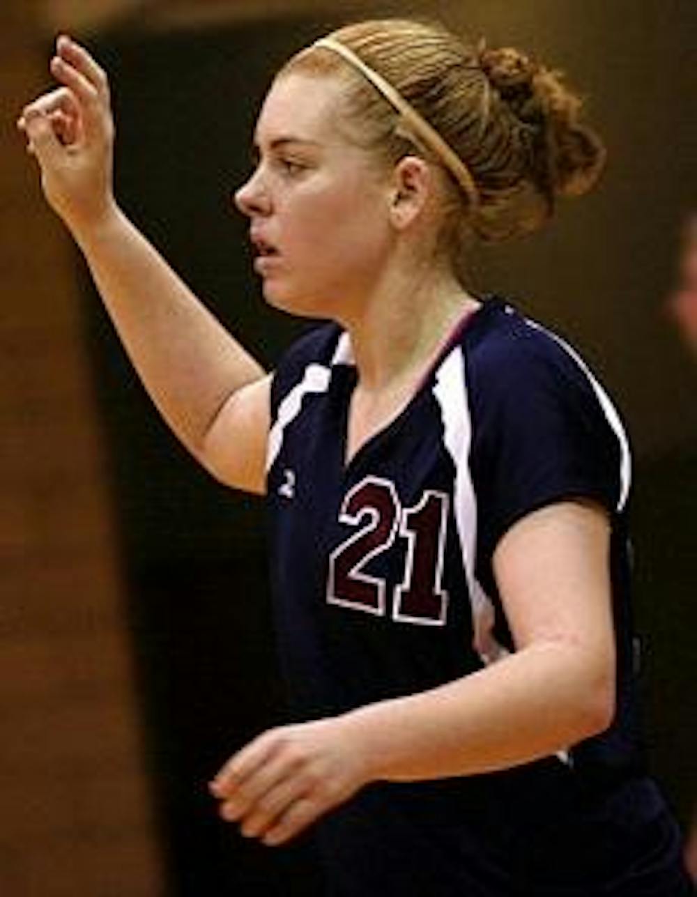 Volleyball: A QB on the court; a fashion standout