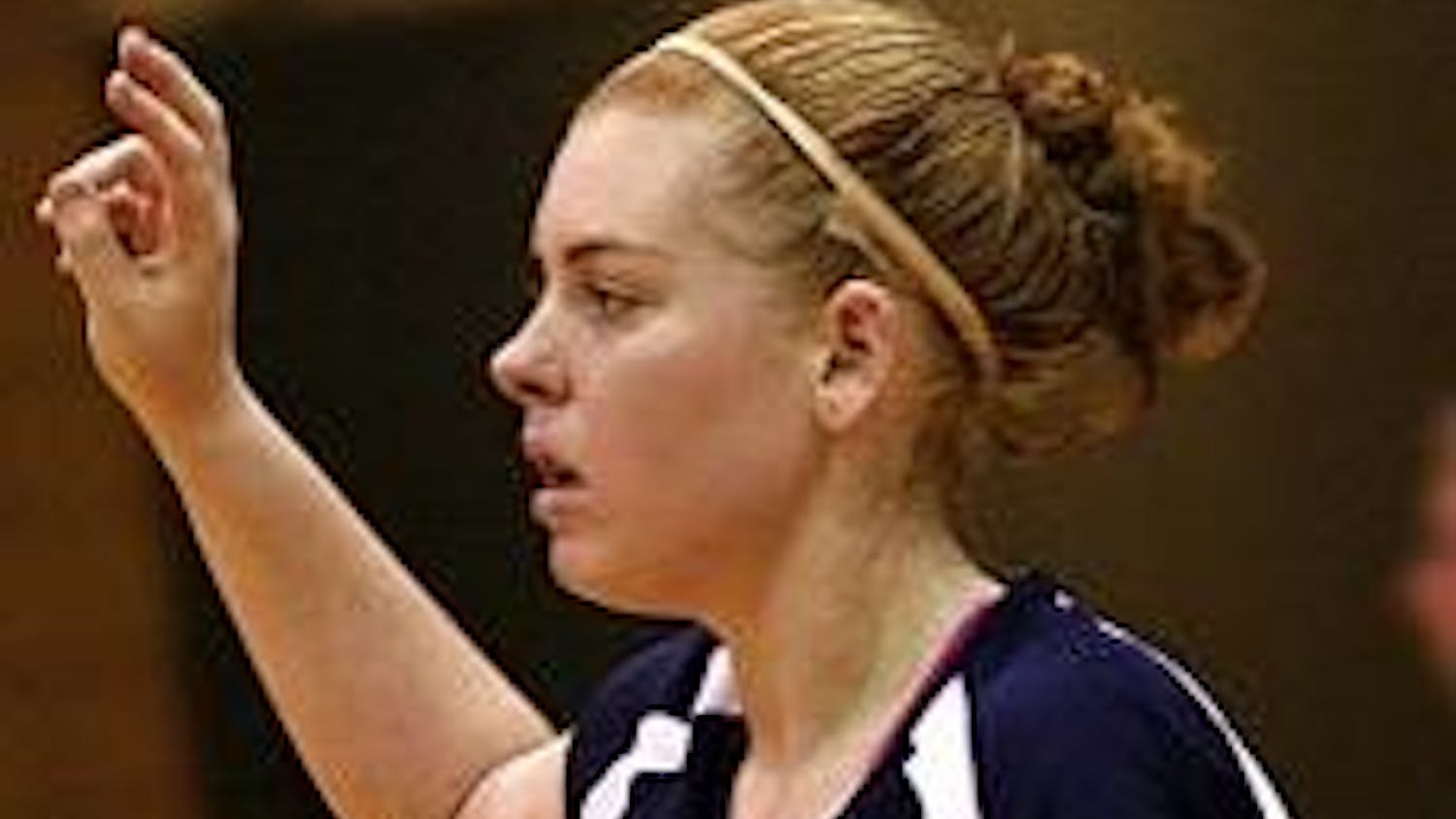 Volleyball: A QB on the court; a fashion standout