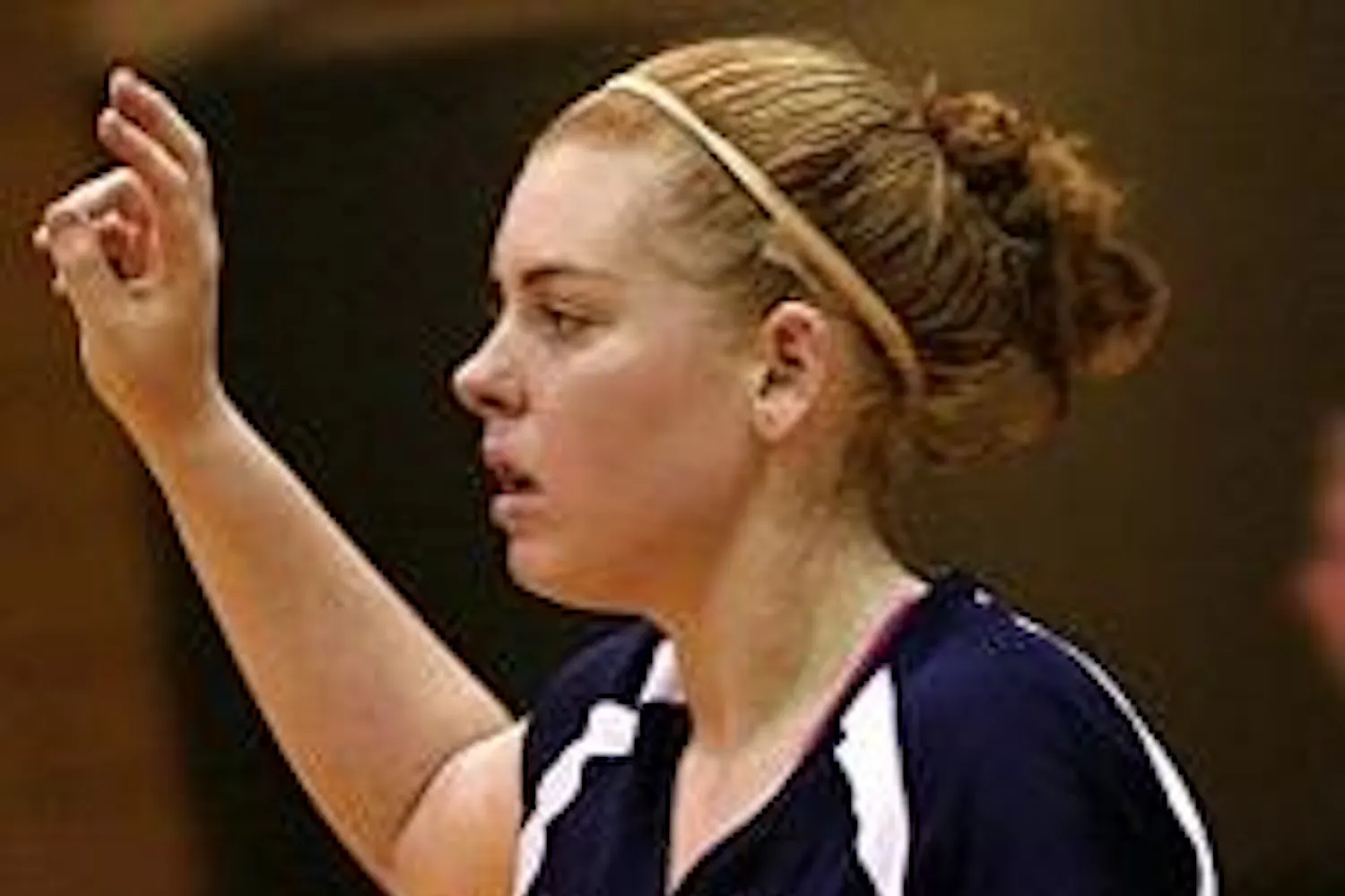 Volleyball: A QB on the court; a fashion standout