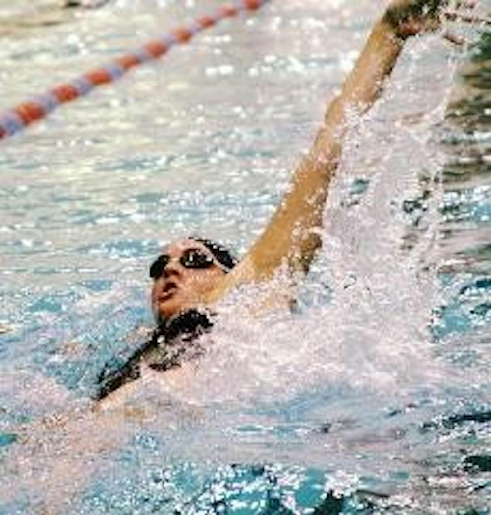 M. Swimmers coast, women fall short in Ohio