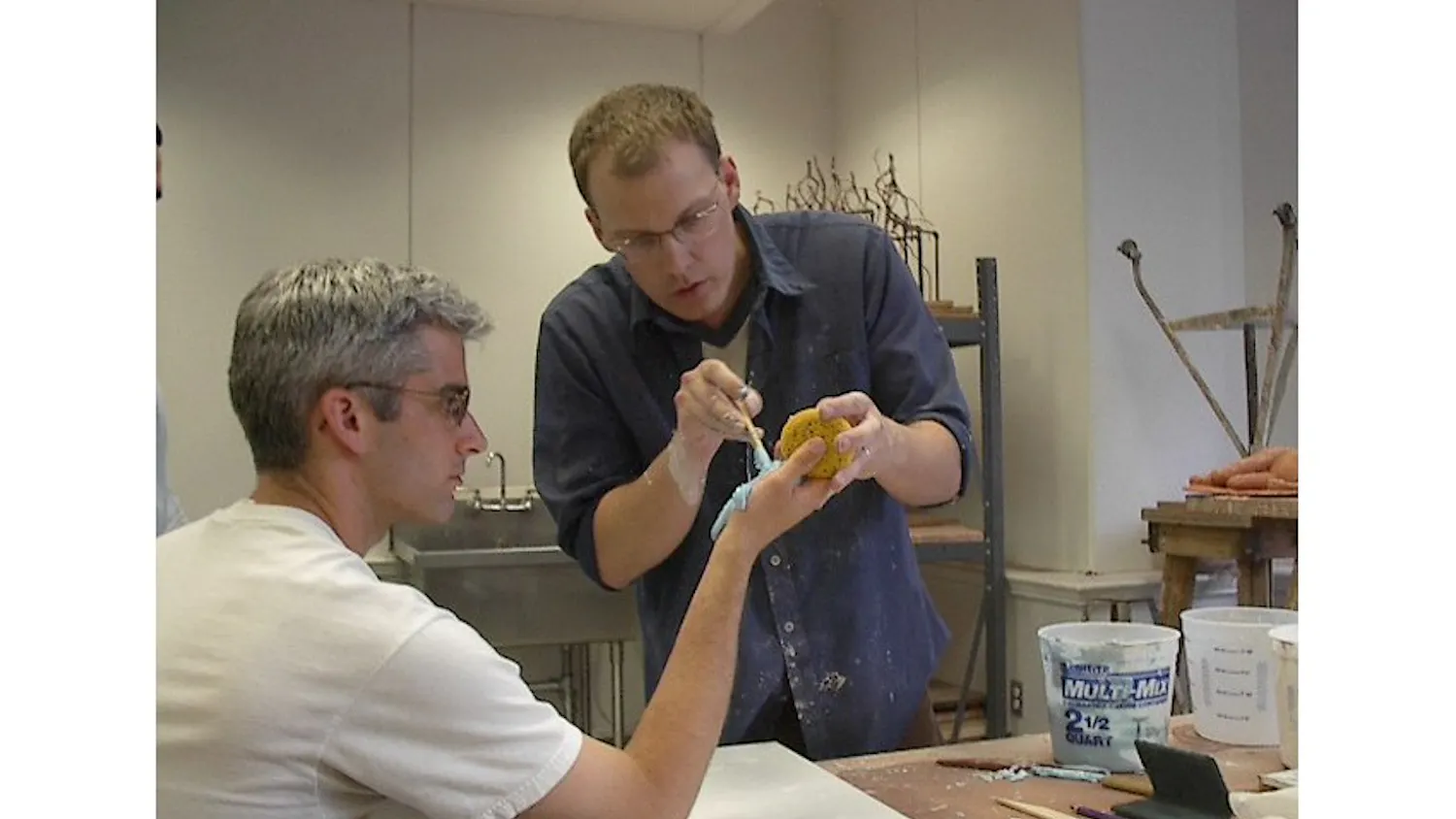 1993 School of Design graduate Mark Lueders used an alginate-based rubber to make molds for 57 hands from 30 artists.