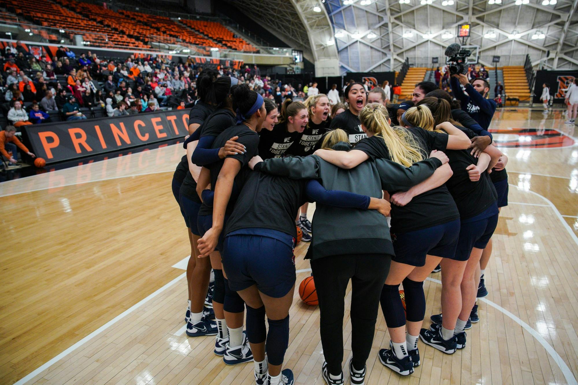 01-16-23 Women's Basketball vs Princeton Team Huddle (Anna Vazhaeparambil)-01.jpg