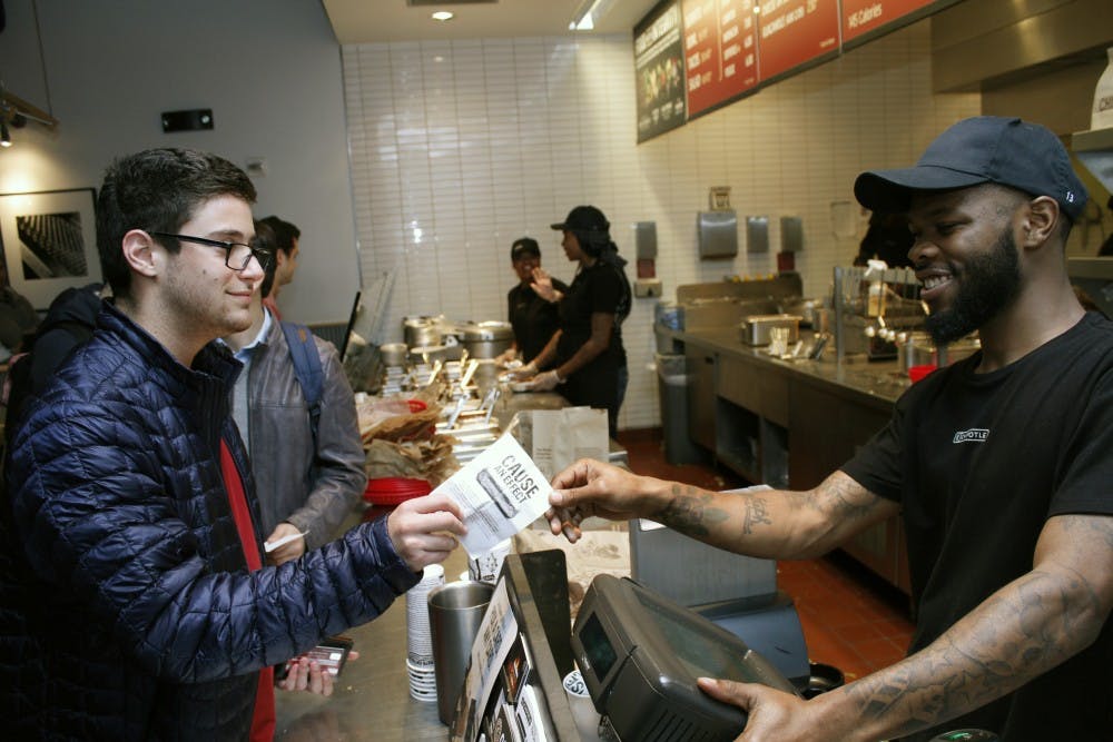 College sophomore Benjamin Pollack (left), Sammy Philanthropy Co-Chair, organized a fundraiser event at Chipotle on Tuesday. Proceeds will go to the Judy Fund, which supports Alzheimer's research.