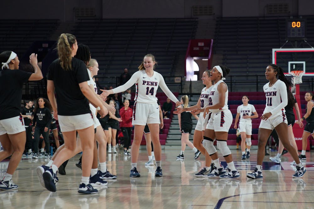 02-11-23 Women's Basketball vs Harvard Celebration (Anna Vazhaeparambil).jpg