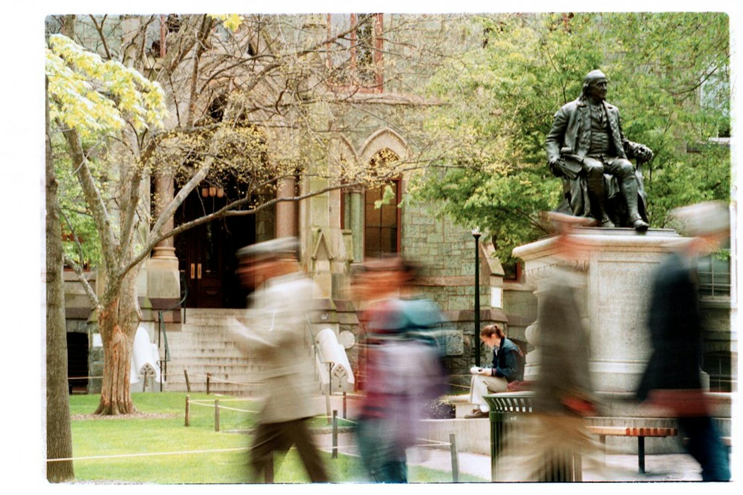 Ad feature of College hall and ben statue