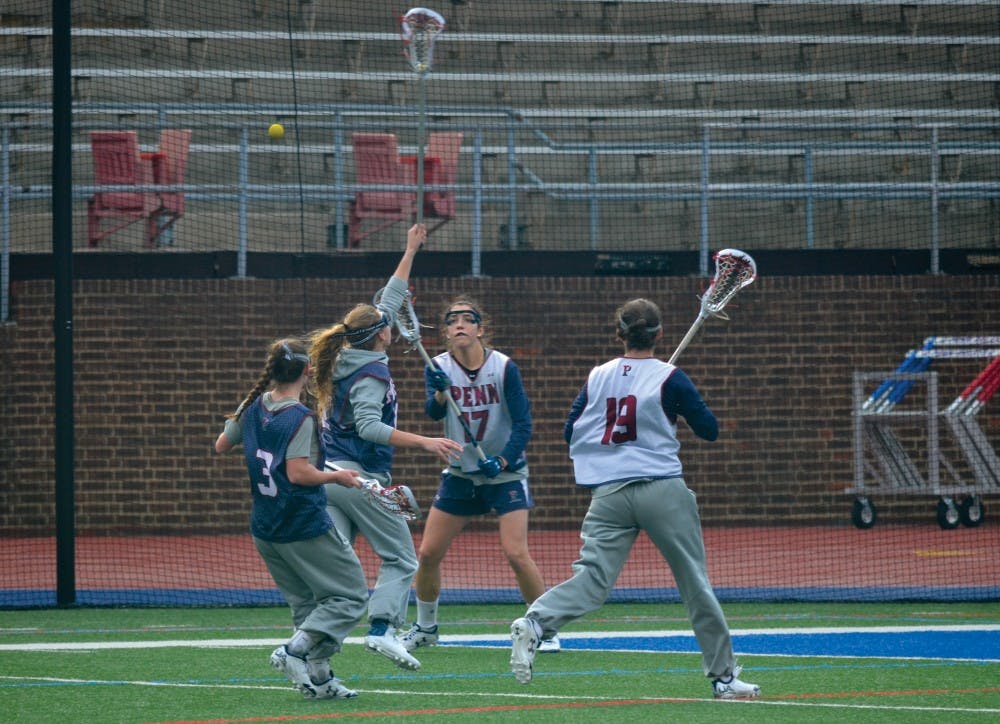 A valiant seven-point effort from senior Nina Corcoran (No. 17) proved to be in vain as Penn women's lacrosse suffered a 10-9 upset loss at Dartmouth. Now, she and freshman sister Chrissy (19) must help the Quakers respond against nationally-ranked Northwestern.