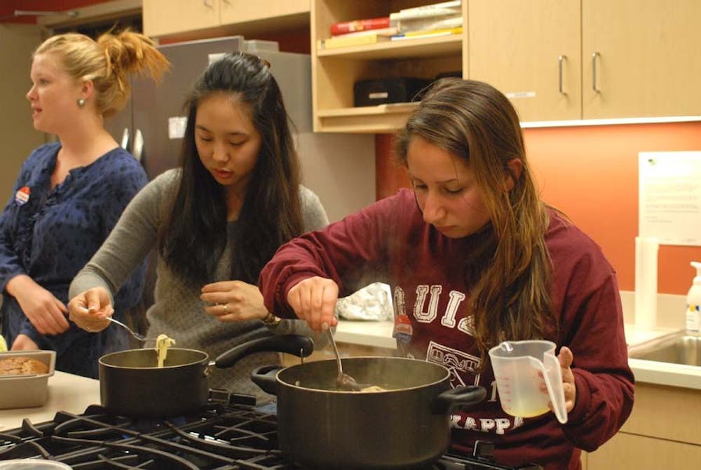Sigma Kappa sisters cook for the residents of the transplant house