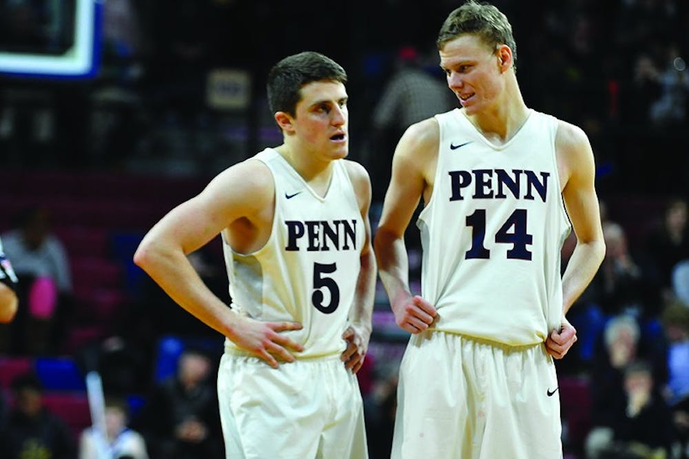 Jackson Donahue (right) and Sam Jones each made key shots for three-point range in Penn men's basketball's 79-74 win over Brown.