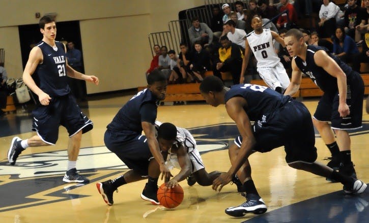 	Penn sophomore Patrick Lucas-Perry fights for a loose ball. He scored 6 points on the night on 3 of 5 shooting from three.