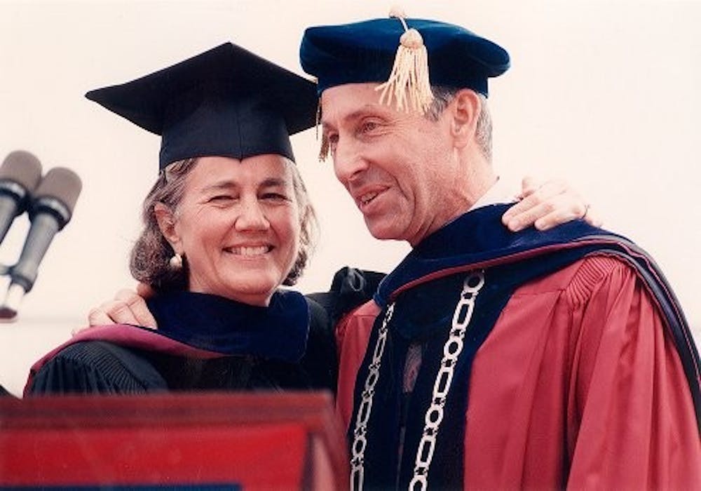 	Sheldon Hackney stands with his wife, Lucy, at a commencement ceremony. 