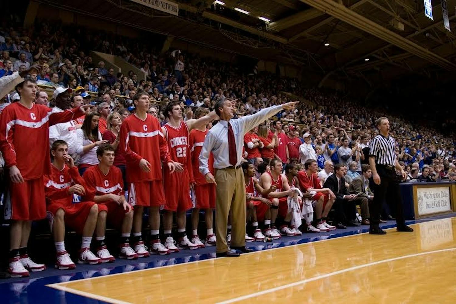 Former Penn assistant Steve Donahue (center) is seen as one of the top candidates to replace Jerome Allen as Penn basketball head coach. Donahue won three straight Ivy titles at Cornell before coaching at Boston College for four seasons.
