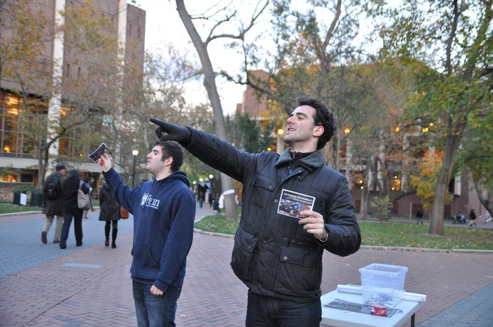 On the day of the election, Penn Leads The Vote distributed flyers and called registered voters who had not voted yet. 

Dan Bernick (C14) 
Joseph Egozi (C14) -> brunette, curly hair, greem jacket

AJ Schiera (SAS 09, GSE 10) -> PLTV Advisor, glasses, bald