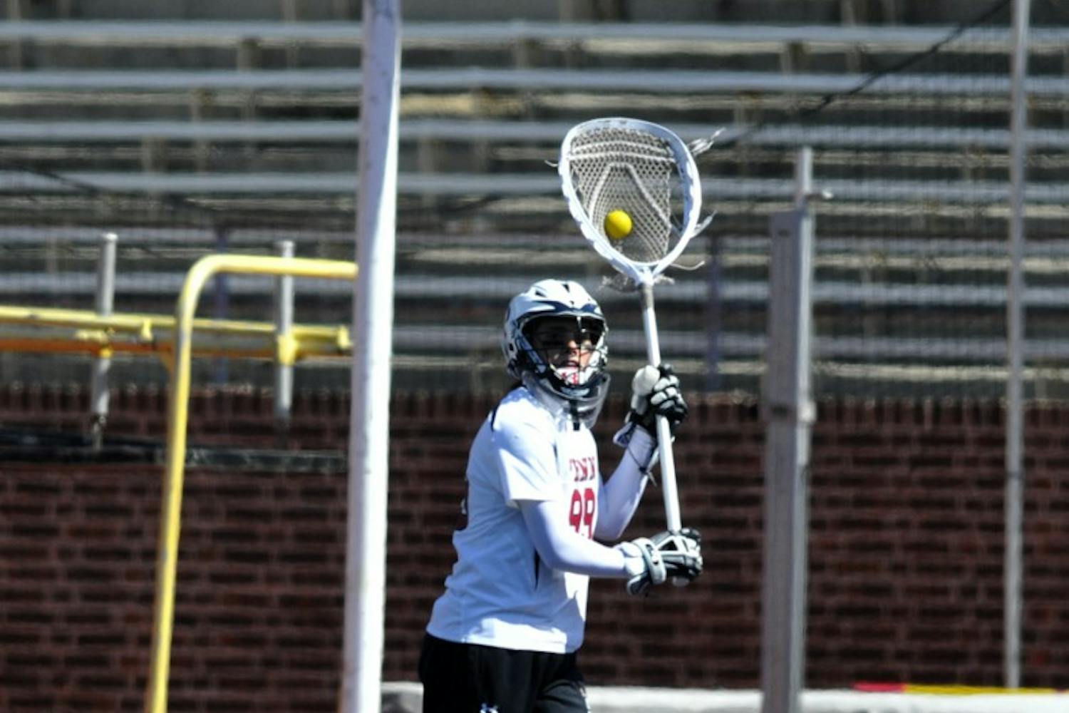 Styles clash in lax showdown