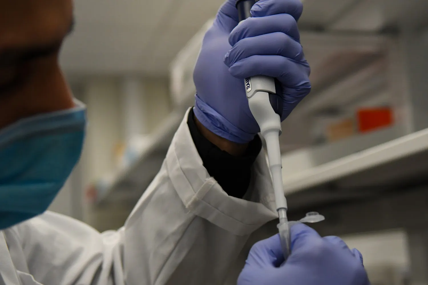 Research Laboratory Penn Medicine Worker Pipette.jpg