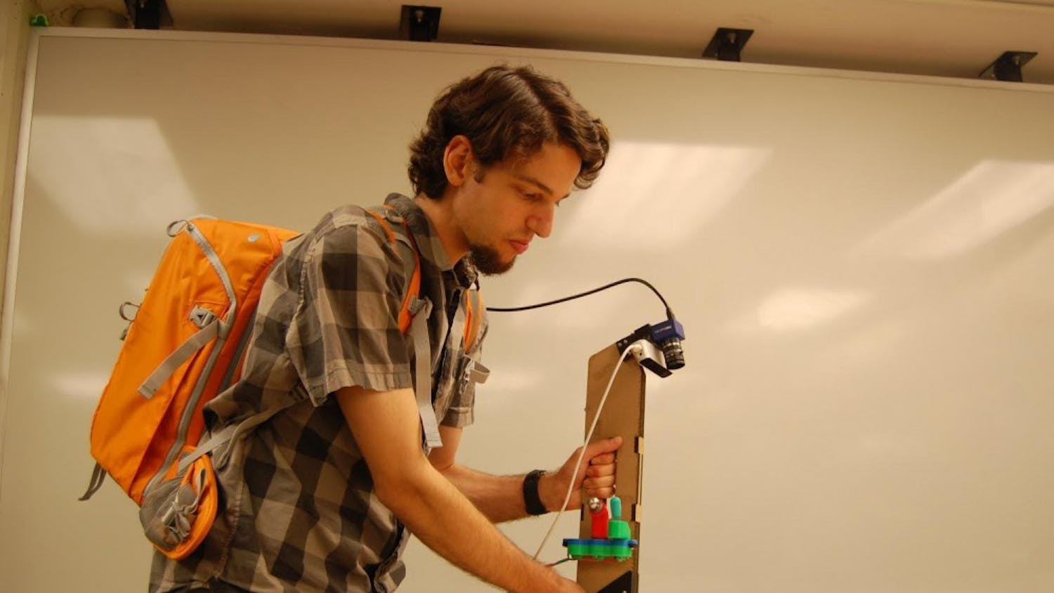 Courtesy of Alex Burka // The 5th-year Ph.D student is pictured here with his orange "Proton Pack."