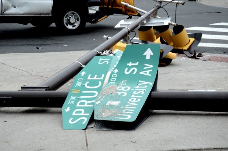 	A car knocked down a street pole around the intersection of 38th and Spruce Friday afternoon. 
