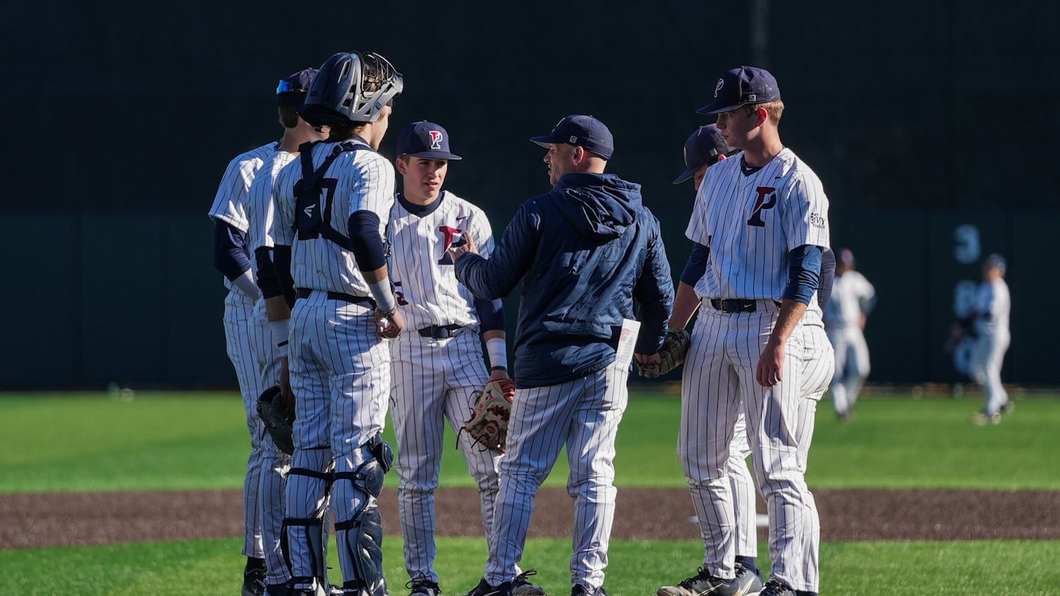 03-15-23 Baseball vs Villanova Team Huddle (Anna Vazhaeparambil).jpg