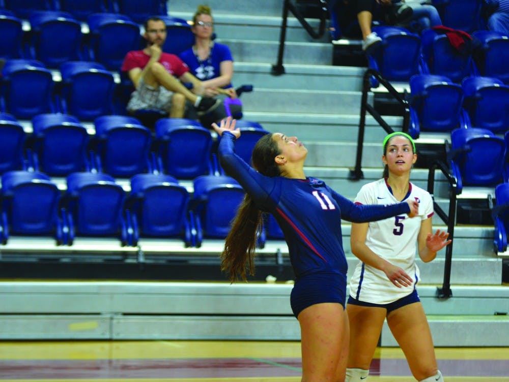 Sophomore outside hitter Courtney Quinn (#11) says Penn volleyball has something to prove against Harvard this weekend after a three-set loss last year. The Quakers host Harvard and Dartmouth at the Palestra.