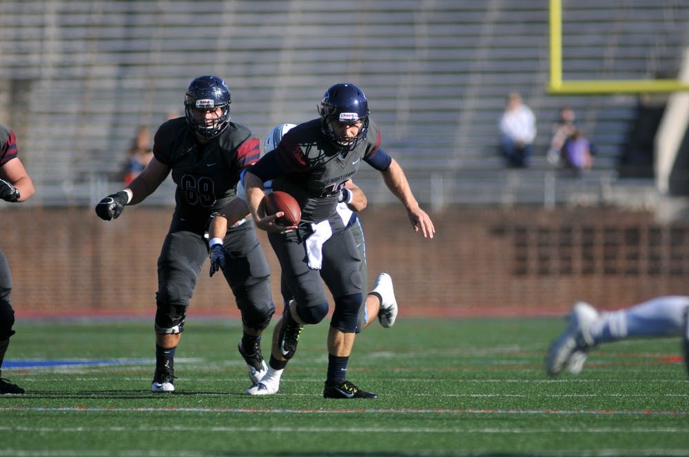 Senior quarterback Alek Torgersen will lead the Penn offense into Friday's matchup at Yale, the first night game in Yale Bowl history.
