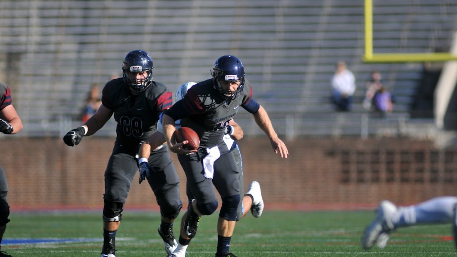 Senior quarterback Alek Torgersen will lead the Penn offense into Friday's matchup at Yale, the first night game in Yale Bowl history.