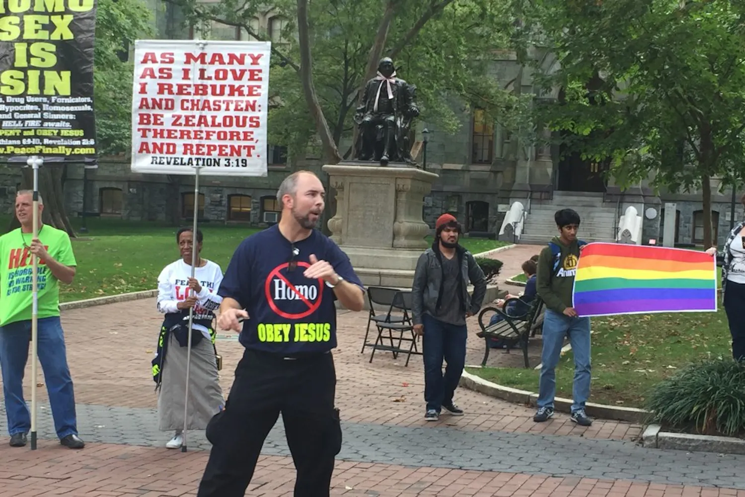 "We use the shocking parts of the Bible to draw them in. And it works every time,” said JK (pictured in green to the left). 